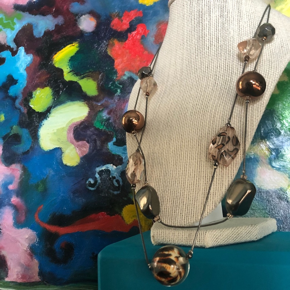 Necklace with gold, silver, leopard-print beads
